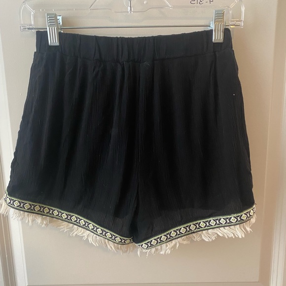 Black shorts with green and white trim - Picture 2 of 2